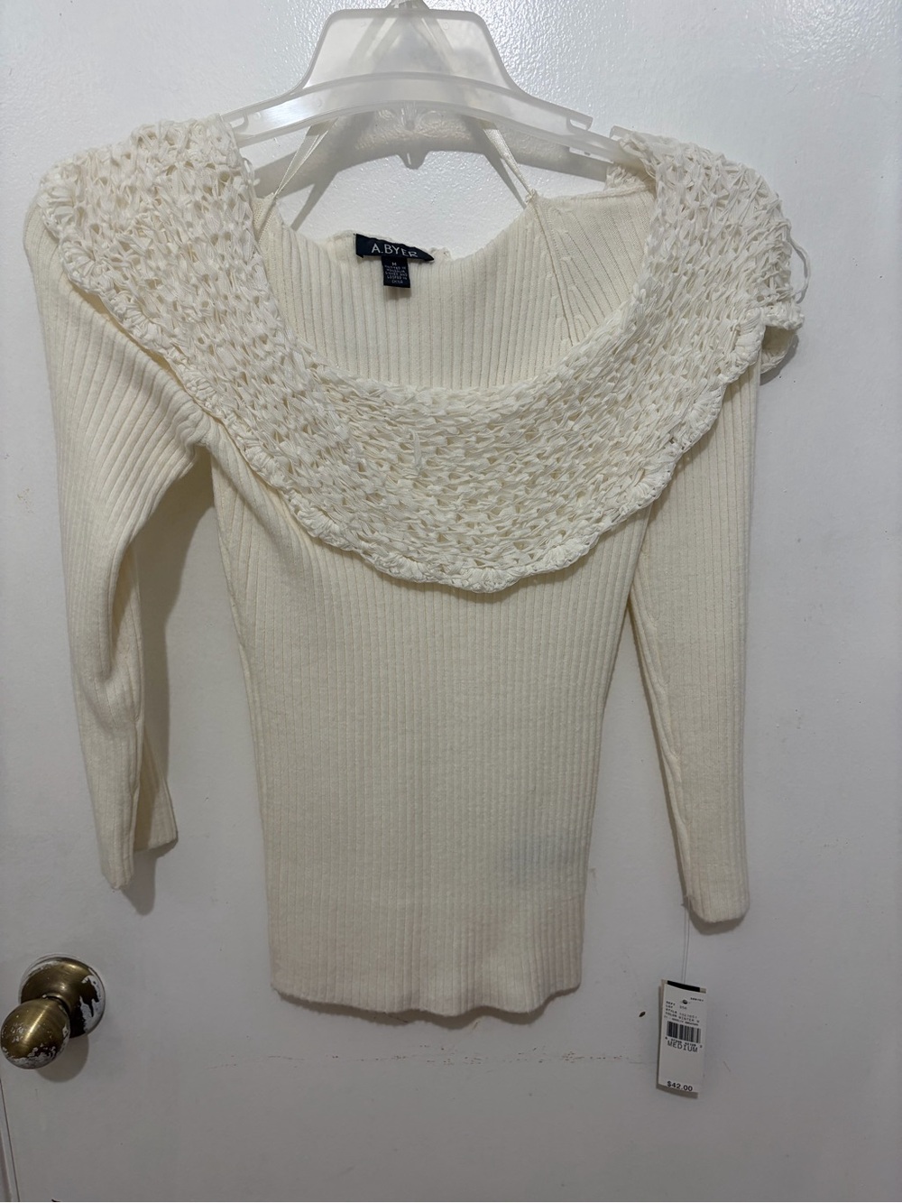 A. Byer Off-the-Shoulder Cream Ribbed Sweater with Crochet Trim
